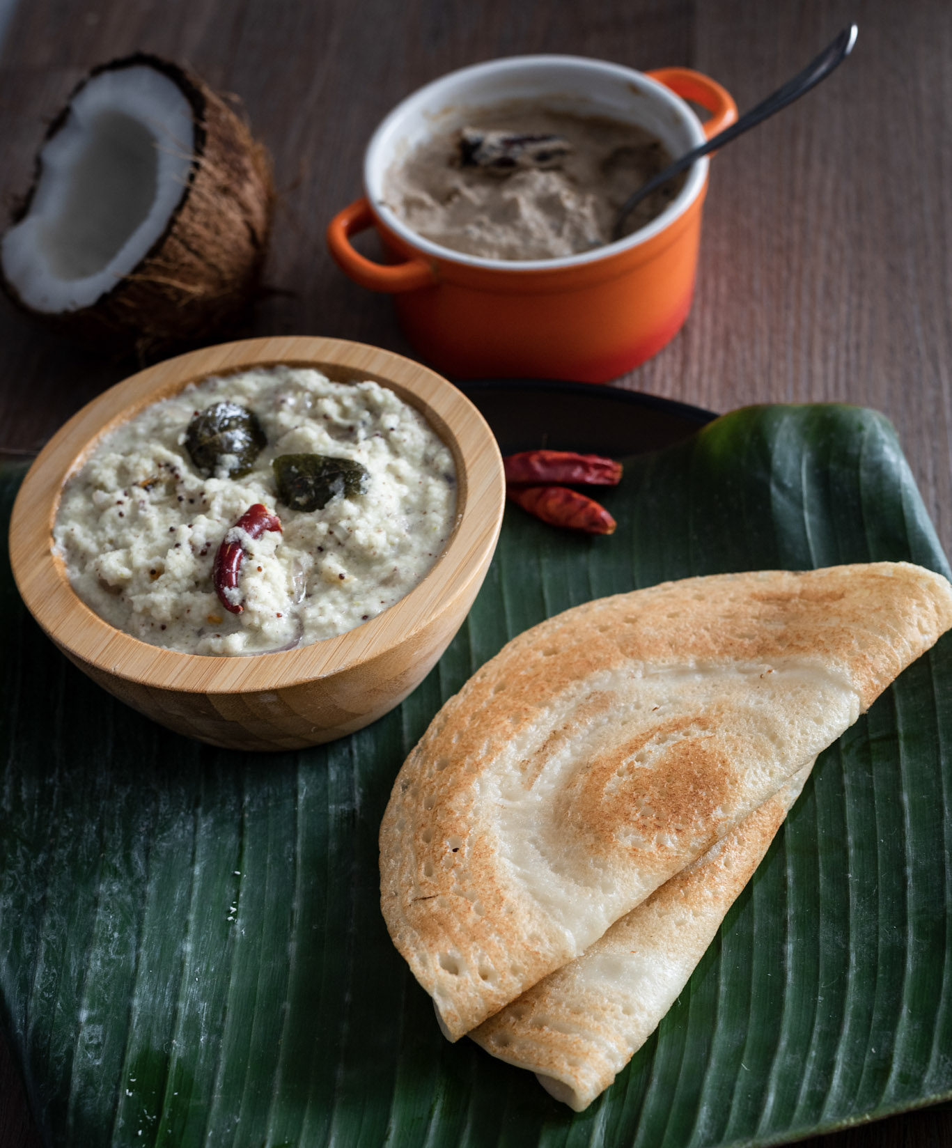 Coconut chuntey served swith dosa on a banana leaf