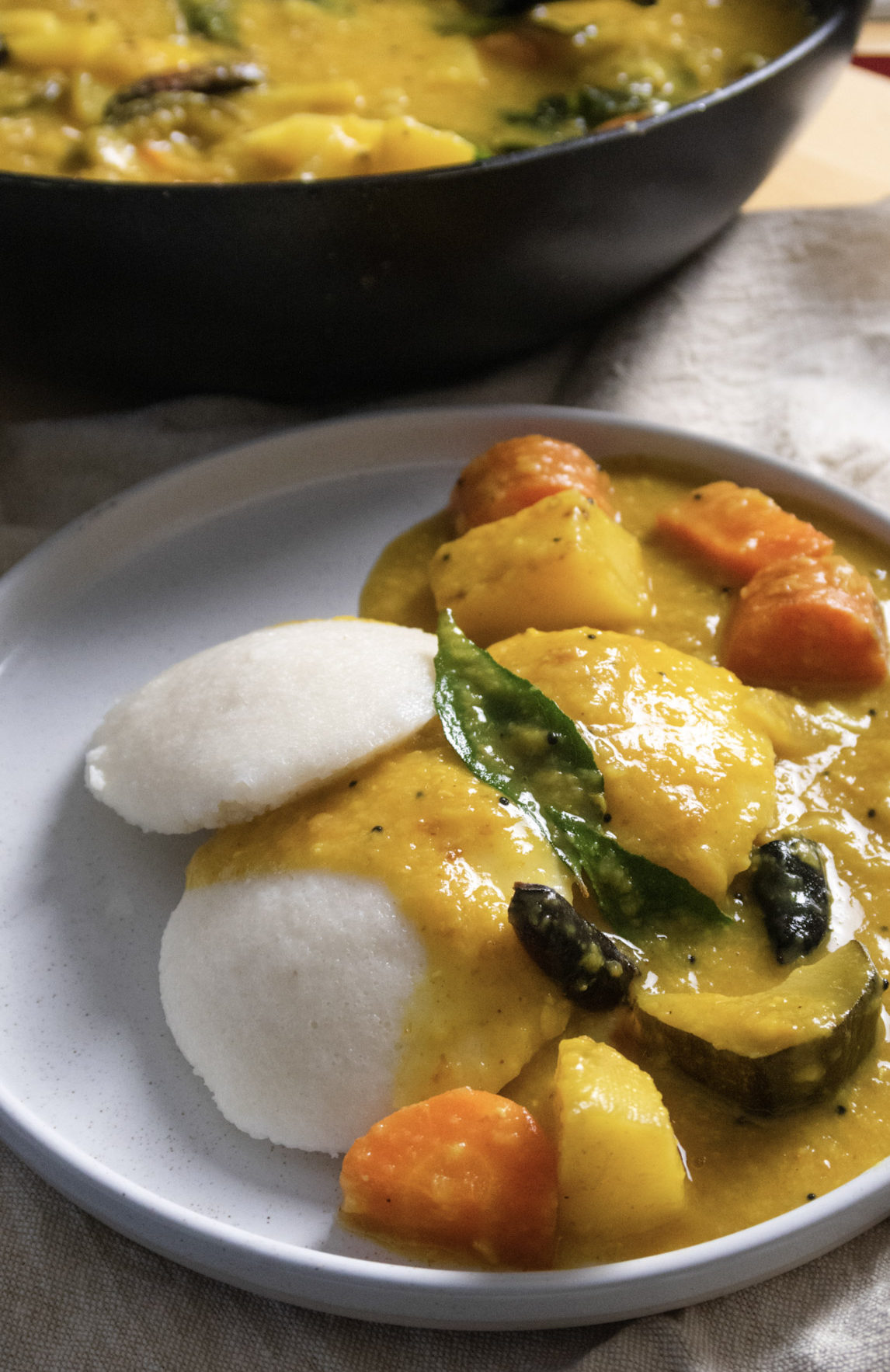 Sambar served on 3 idli