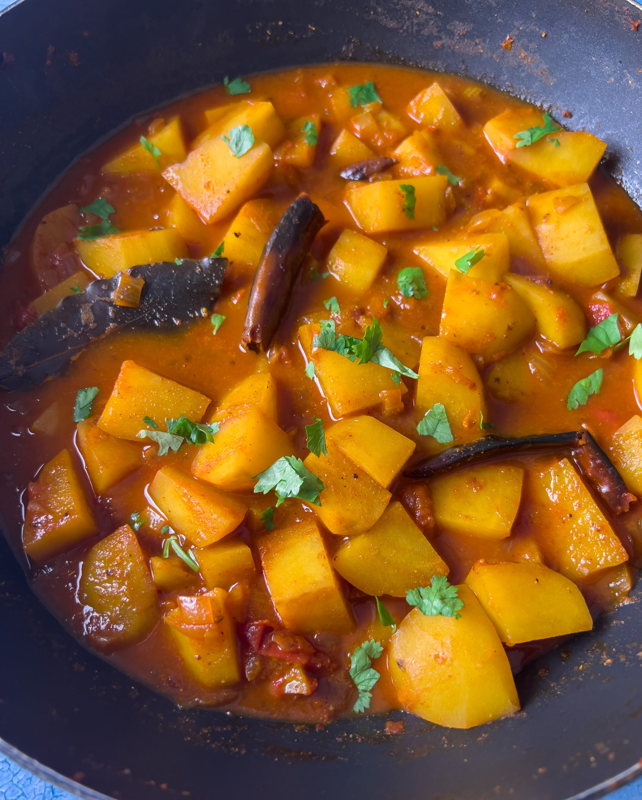 Top shot of dum aloo placed in a bowl