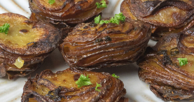 plate of spicy mini pommes anna